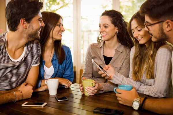 depositphotos 225911158 stock photo group friends talking drinking coffee