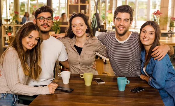 depositphotos 239698798 stock photo group friends looking camera drinking
