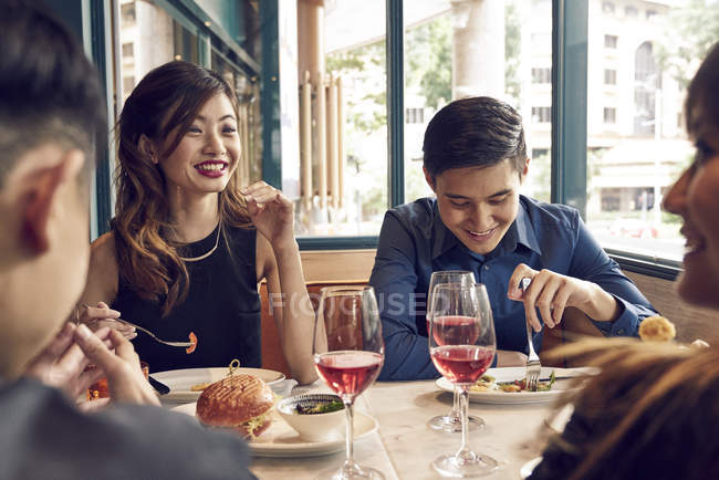 focused 212428672 stock photo company young asian friends together